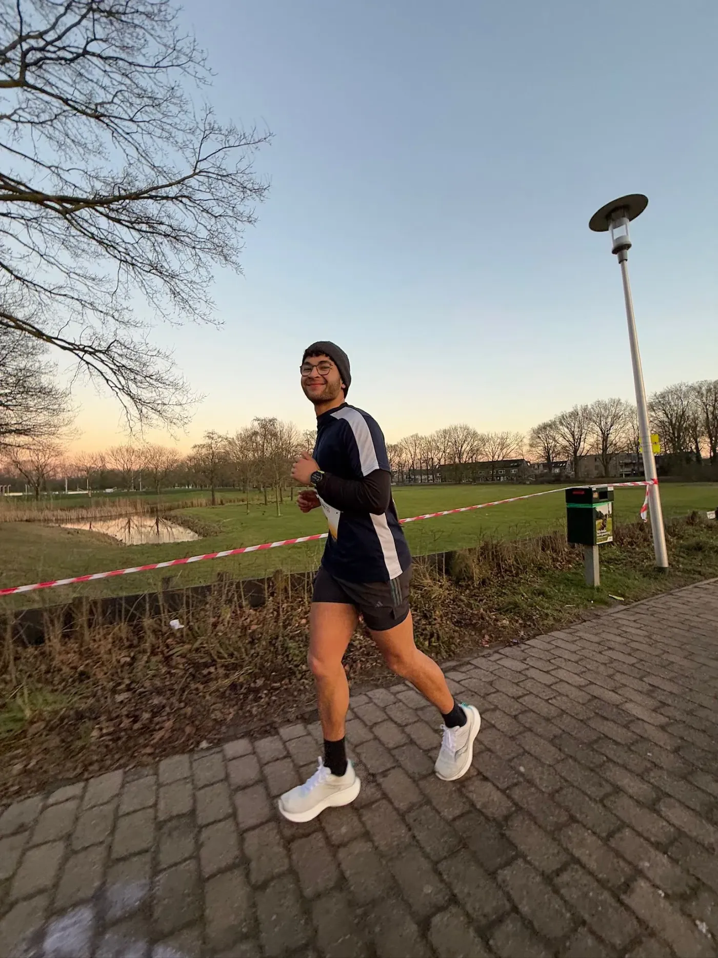 Sem Koopman smiling during ultramarathon run — documentary by 7EMPLE